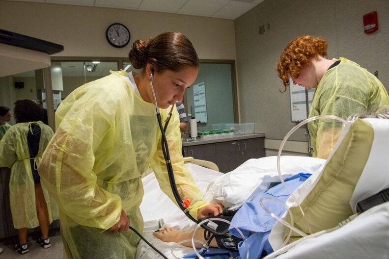 Native high school students participate in simulated care activities