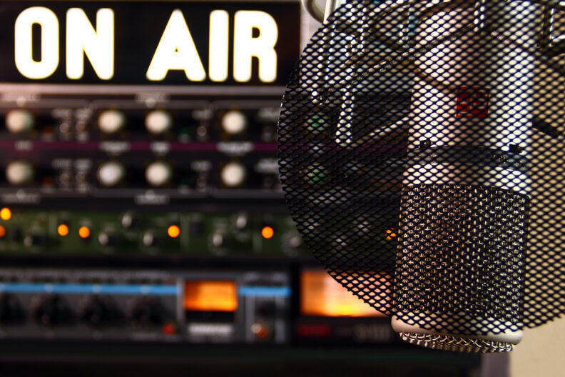 Closeup of a radio microphone in a studio.