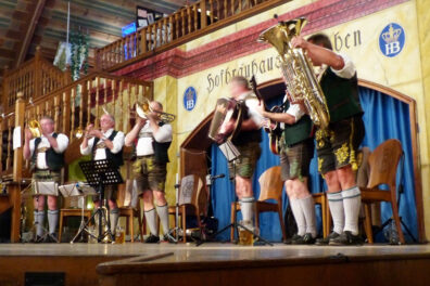 A band in traditional German dress playing at Oktoberfest.