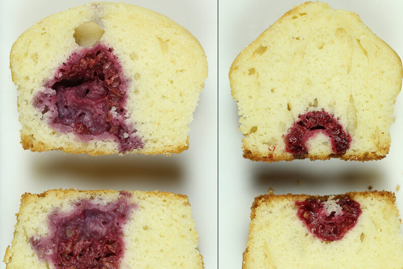 Two raspberry muffins side by side