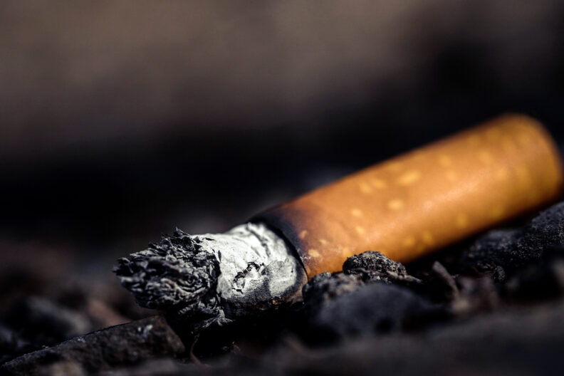 Closeup of used cigarette.