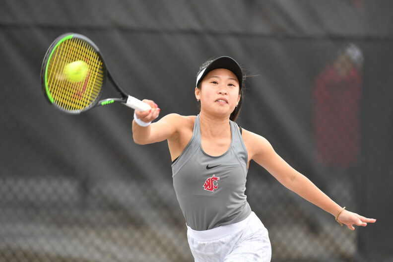 Closeup of Savanna Ly-Nguyen playing tennis.