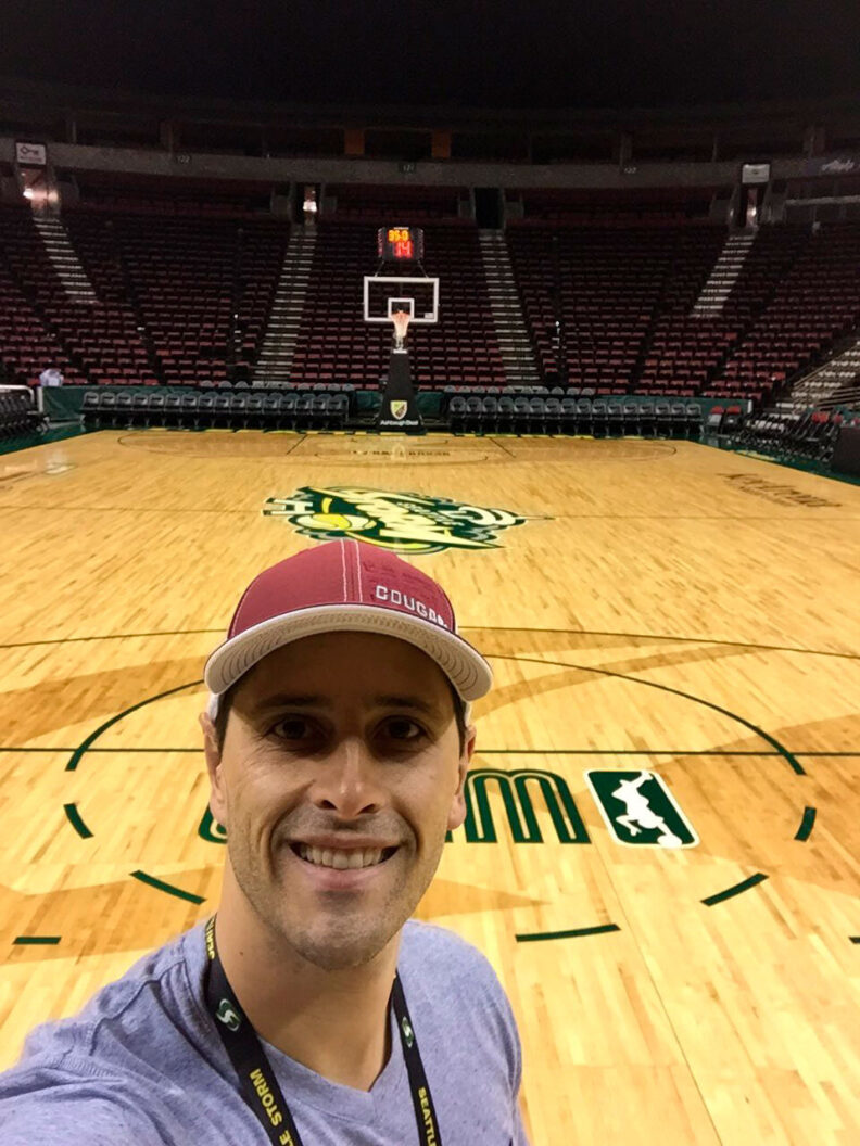 Nate Silverman standing on the Seattle Storm basketball court