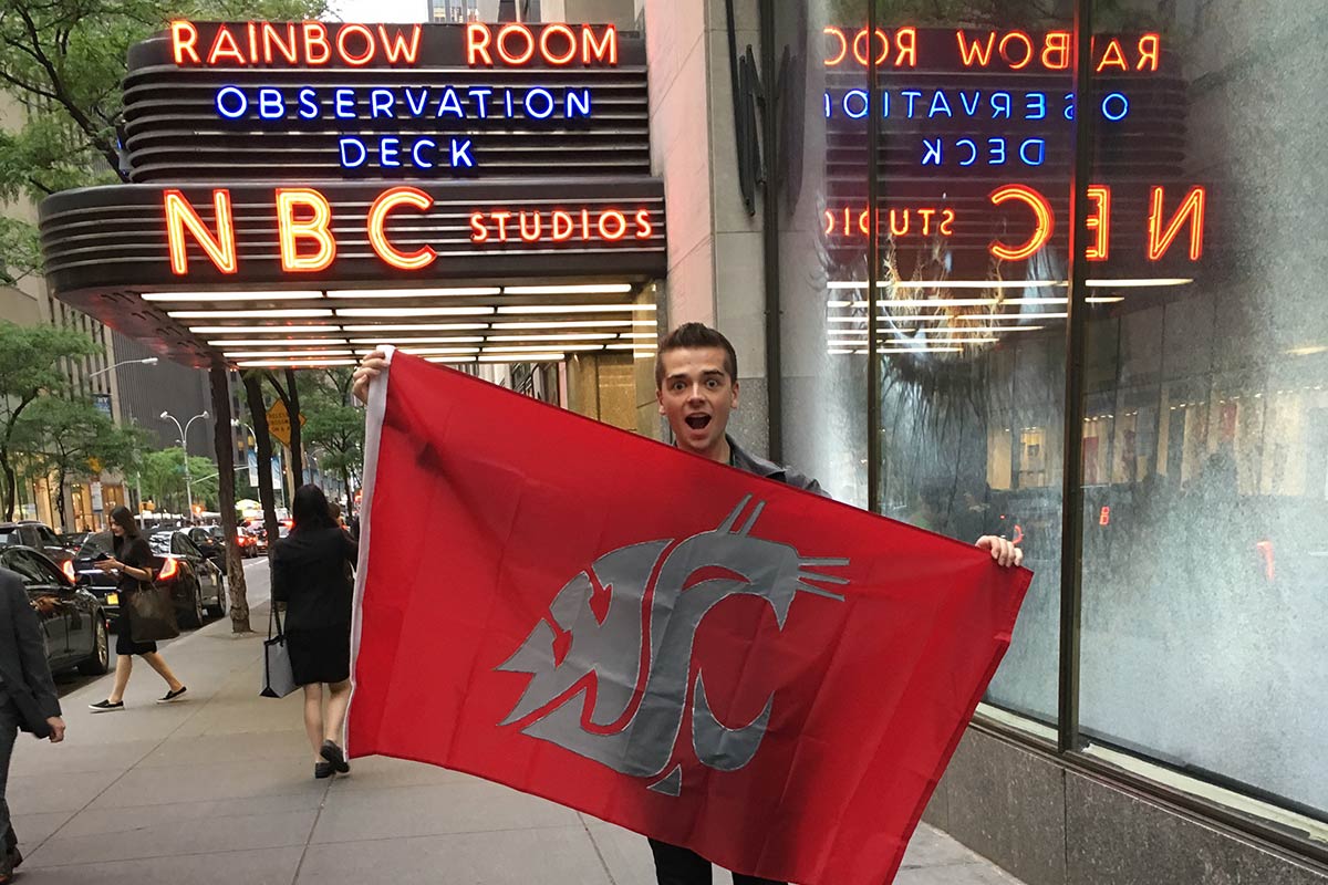 Jake waving Ol' Crimson at the NBC studios in New York