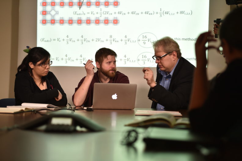 Fanglin Che, Greg Collinge, and Dr. Jean-Sabin McEwen discussing research