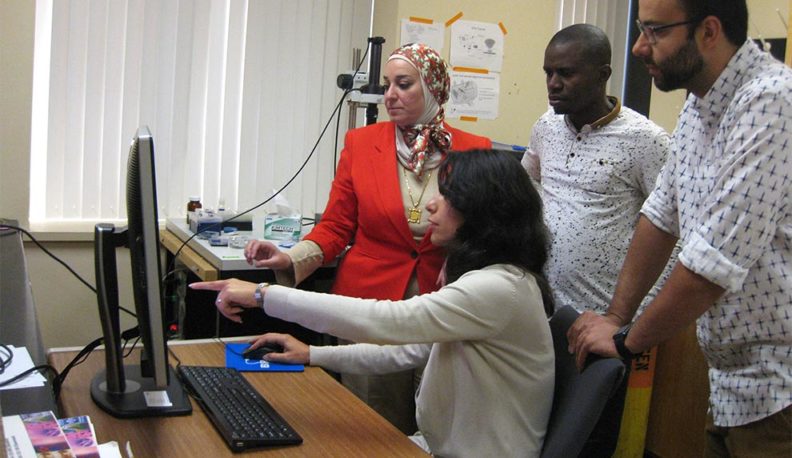 Dr. Nehal Abu-Lail with her graduate students, Somayeh Ramezanian, Samuel Uzoechi, and Baran Arslan