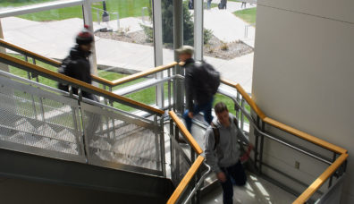 Students walking down stairs