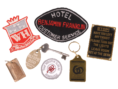 Keys, tags, and badges from hotels owned by the Westin chain.