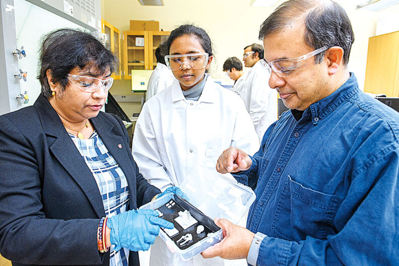 Engineering professors Susmita Bose and Amit Bandyopadhyay examine 3D printed implants